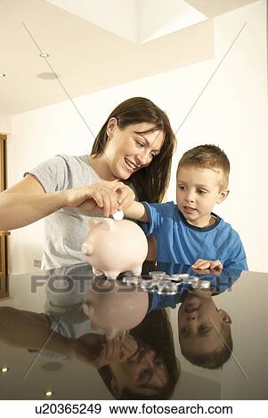 mum and son with money View Large Photo Image Stock Photo - mum and son with money. Fotosearch