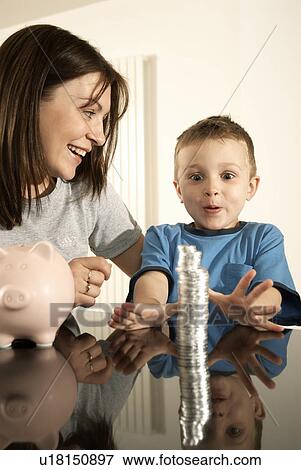 mum with son and money View Large Photo Image Stock Photo - mum with son and money. Fotosearch