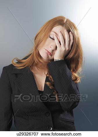 Office worker looking thoughtful View Large Photo Image Stock Photo - Office worker looking thoughtful. Fotosearch