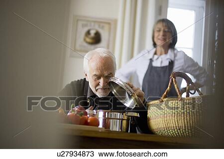 old couple cooking View Large Photo Image Stock Image - old couple cooking. Fotosearch