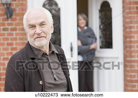 old couple in front of a house View Large Photo Image Stock Image - old couple in front of a house. Fotosearch