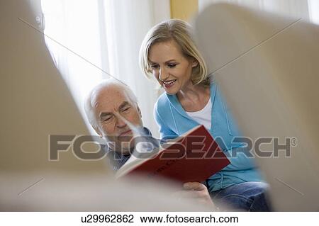 old father and daughter reading book View Large Photo Image Stock Image - old father and daughter reading book. Fotosearch