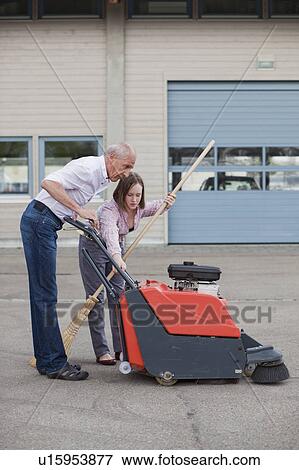 old man and young girl cleaning court View Large Photo Image Stock Photo - old man and young girl cleaning court. Fotosearch