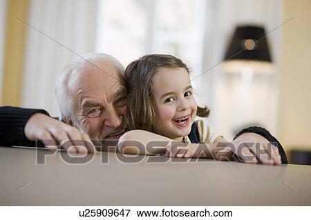 old man and young girl smiling View Large Photo Image Stock Photo - old man and young girl smiling. Fotosearch