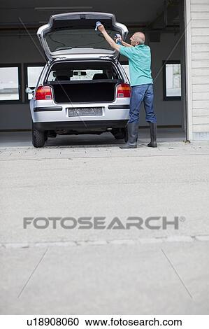 old man cleaning car View Large Photo Image Stock Image - old man cleaning car. Fotosearch