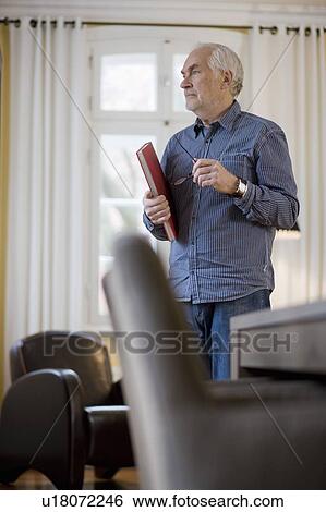 old man with book View Large Photo Image Stock Photograph - old man with book. Fotosearch