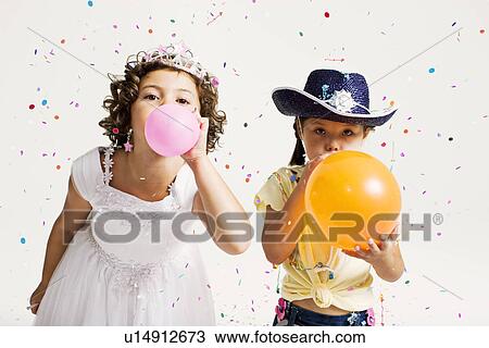 party girls blowing balloons View Large Photo Image Stock Image - party girls blowing balloons. Fotosearch