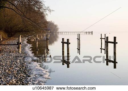 pier and icy lake in winter View Large Photo Image Stock Photo - pier and icy lake in winter. Fotosearch
