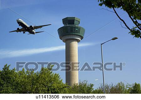 Plane ascending after take off View Large Photo Image Stock Photograph - Plane ascending after take off. Fotosearch