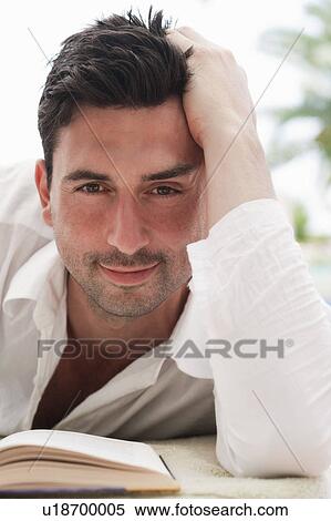 Stock Photography - Portrait Man With Book. Fotosearch