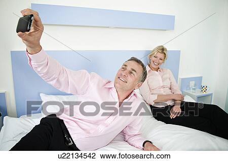 Portrait of a business couple View Large Photo Image Stock Image - Portrait of a business couple. Fotosearch