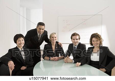Portrait of a business meeting View Large Photo Image Stock Image - Portrait of a business meeting. Fotosearch