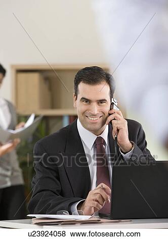 Portrait of a businessman on the phone View Large Photo Image Stock Photo - Portrait of a businessman on the phone. Fotosearch