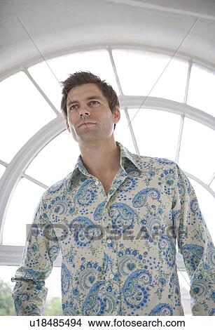 Portrait of a man looking up. View Large Photo Image Picture - Portrait of a man looking up.. Fotosearch