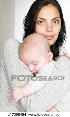 Picture - Portrait of a mother with her baby. Fotosearch