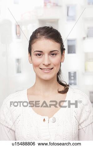 Portrait of a young woman View Large Photo Image Stock Photograph - Portrait of a young woman. Fotosearch