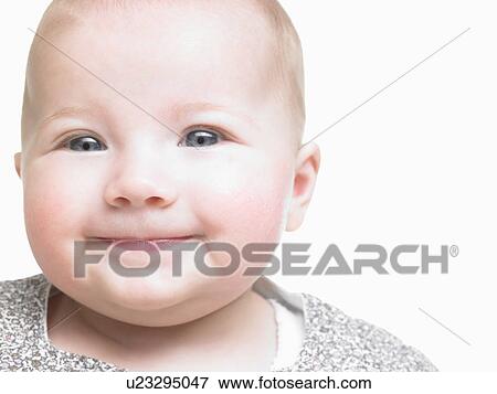 Stock Photo - Portrait of baby girl, smiling. Fotosearch