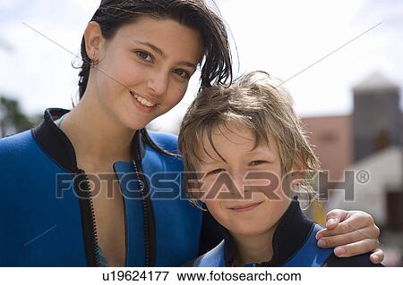 Stock Photo - Portrait of brother and sister. Fotosearch