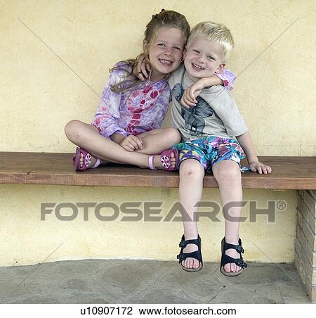 Stock Image - Portrait of Girl and Boy. Fotosearch