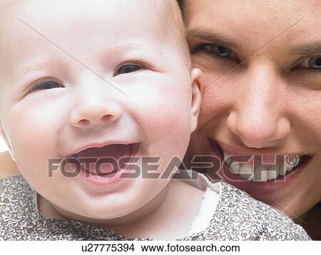 Portrait of mother and baby girl View Large Photo Image Picture - Portrait of mother and baby girl. Fotosearch