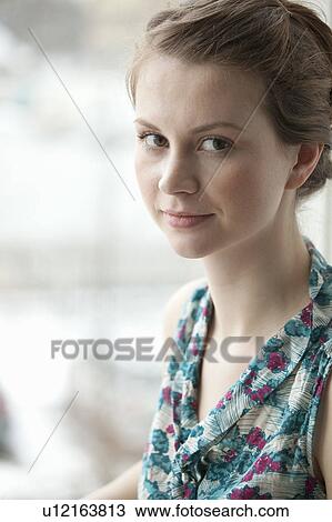 Portrait of young woman View Large Photo Image Stock Image - Portrait of young woman. Fotosearch