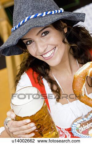 Stock Image - Portrait Young Woman at Oktoberfest. Fotosearch