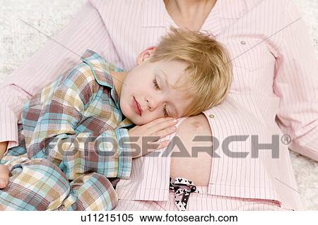 Stock Photography - pregnant woman and boy together. Fotosearch