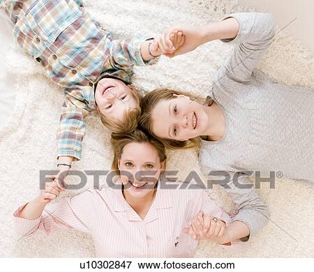 pregnant woman, girl and boy on bed View Large Photo Image Stock Photo - pregnant woman, girl and boy on bed. Fotosearch