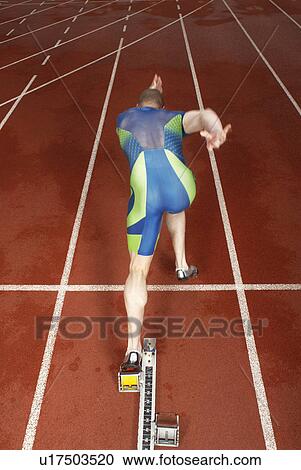 rear view of athlete at start View Large Photo Image Stock Image - rear view of athlete at start. Fotosearch