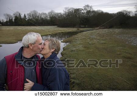Retired Couple Kissing View Large Photo Image Stock Photo - Retired Couple Kissing. Fotosearch