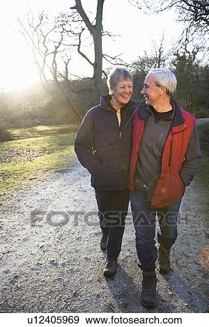 Stock Photo - Retired Couple Walking. Fotosearch