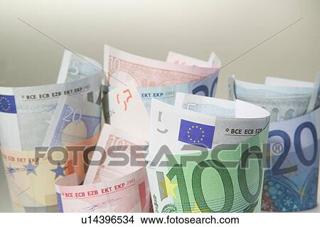Picture - Rolled Euro currency. Fotosearch