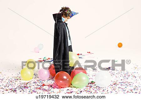 sad boy in party costume View Large Photo Image Stock Image - sad boy in party costume. Fotosearch