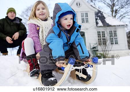 Scandinavian children on a sled View Large Photo Image Stock Image - Scandinavian children on a sled. Fotosearch