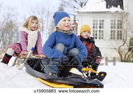 Scandinavian children on sleds View Large Photo Image Stock Image - Scandinavian children on sleds. Fotosearch