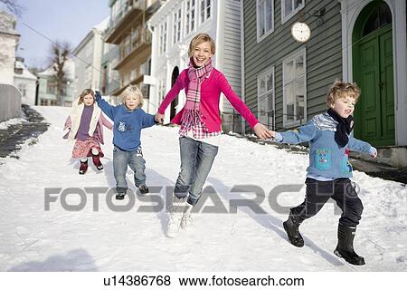 Scandinavian children running in snow View Large Photo Image Stock Photo - Scandinavian children running in snow. Fotosearch