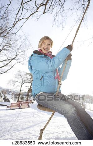 Scandinavian teenage girl on a swing View Large Photo Image Stock Image - Scandinavian teenage girl on a swing. Fotosearch