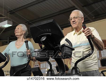senior couple training at gym View Large Photo Image Stock Photograph - senior couple training at gym. Fotosearch
