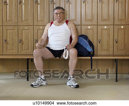 senior man in changing room at gym View Large Photo Image Picture - senior man in changing room at gym. Fotosearch