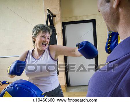 senior woman boxing exercise View Large Photo Image Stock Image - senior woman boxing exercise. Fotosearch