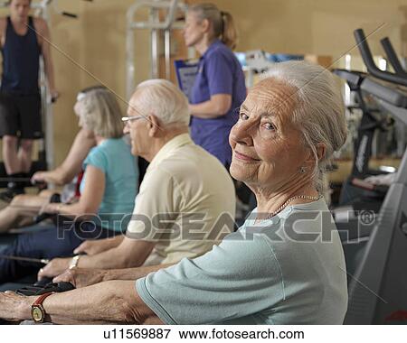 seniors training at gym with instructor View Large Photo Image Stock Photo - seniors training at gym with instructor. Fotosearch