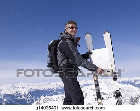 Stock Image - ski instructor teaching. Fotosearch