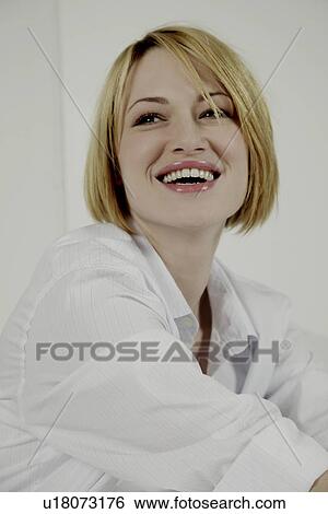 Smiling portrait of a woman. View Large Photo Image Stock Photograph - Smiling portrait of a woman.. Fotosearch