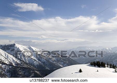 Stock Photo - snow covered mountains. Fotosearch