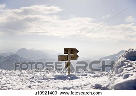 snow covered mountains, way sign View Large Photo Image Stock Photo - snow covered mountains, way sign. Fotosearch