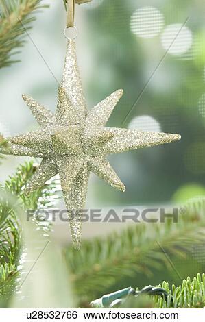 Stock Photograph - Star Christmas ornament. Fotosearch
