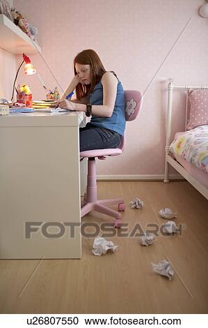 Teenage girl doing homework View Large Photo Image Stock Image - Teenage girl doing homework. Fotosearch