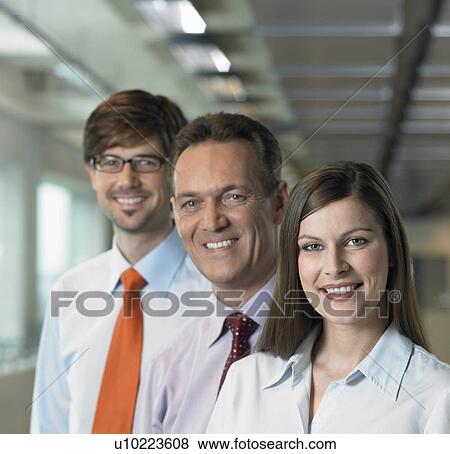 Three Businesspeople, close up View Large Photo Image Stock Photo - Three Businesspeople, close up. Fotosearch