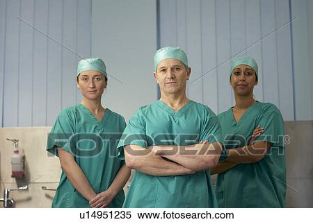 Three medical staff in scrubs View Large Photo Image Stock Photography - Three medical staff in scrubs. Fotosearch