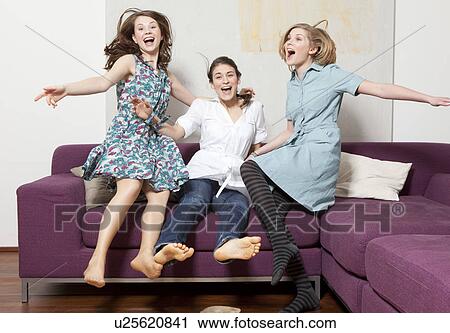 Three women jumping and jubilating View Large Photo Image Stock Image - Three women jumping and jubilating. Fotosearch